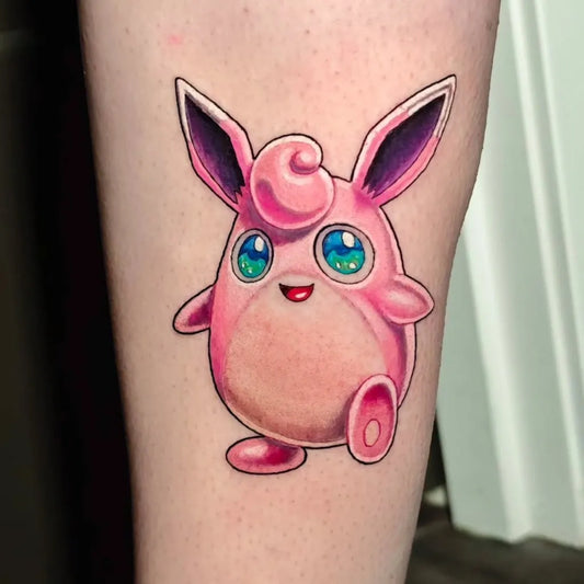 Small Neo Traditional Pink Pokemon Tattoo on Women Thigh by @jeffmarc.tattoo