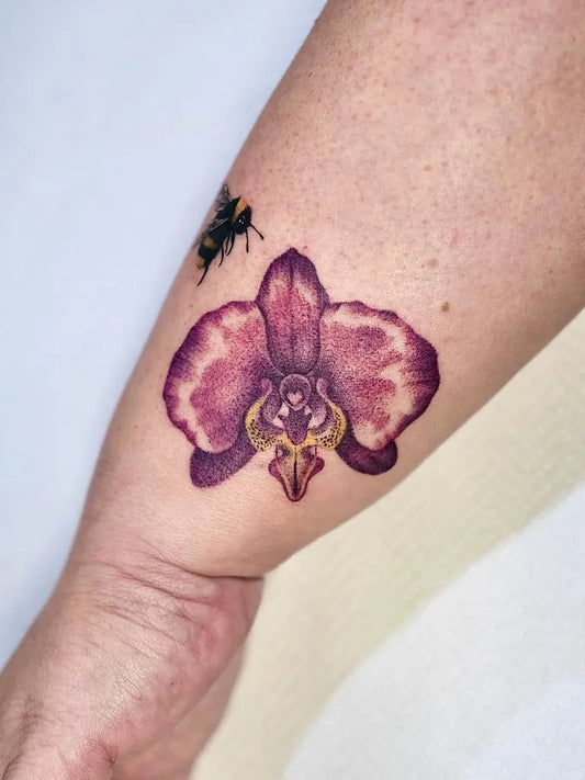 Small Neo Traditional Purple Orchid and Wasp on Women Forearm Flower Tattoo by @yuan.tattoo.art