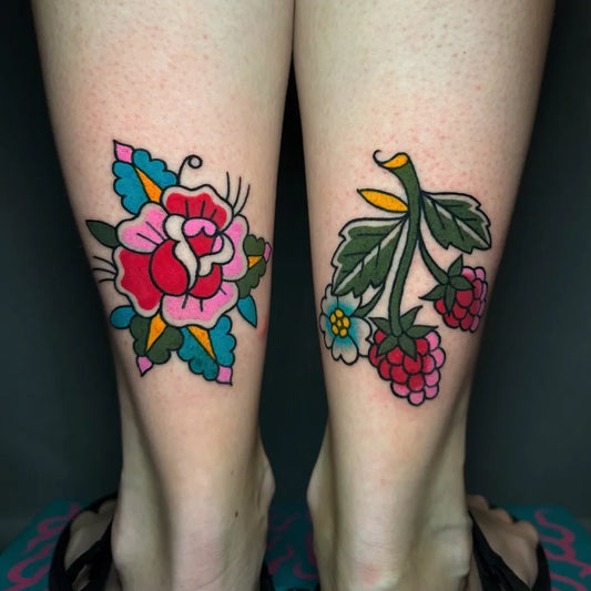 Small Neo Traditional Rose and Raspberry on Women Legs Tattoo by @lalagrimatattoo