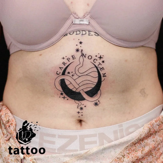 Small Neo Traditional Snake Moon on Women Sternum Tattoo by @nikoladosentattoo