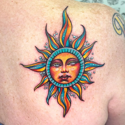 Small Neo Traditional Sun on Women Shoulder Tattoo by @allisonetattoo