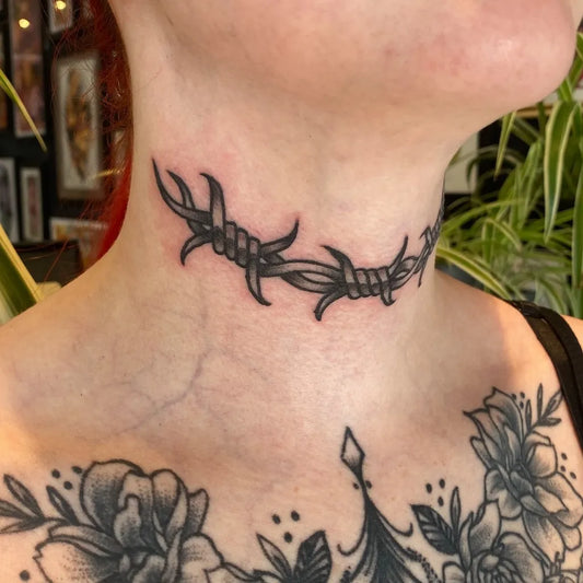 Small Neotraditional Barbed Wire on Women Neck Tattoo by @rogan_tattoo