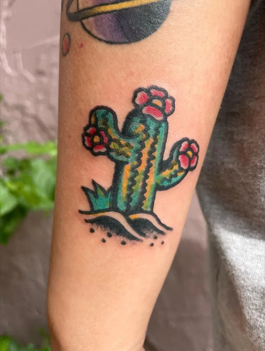 Small Neotraditional Cactus with Flowers Tattoo on Women Arm by @andy10toasty