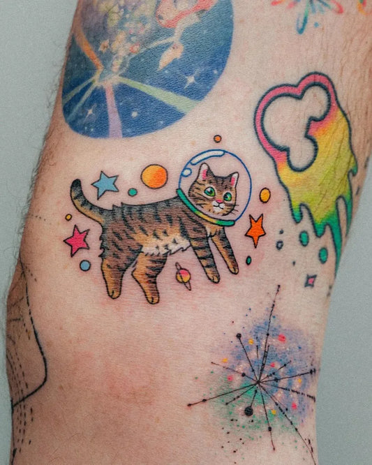 Small Neotraditional Cat in Spacesuit Tattoo on Men Arm by @bongkee_