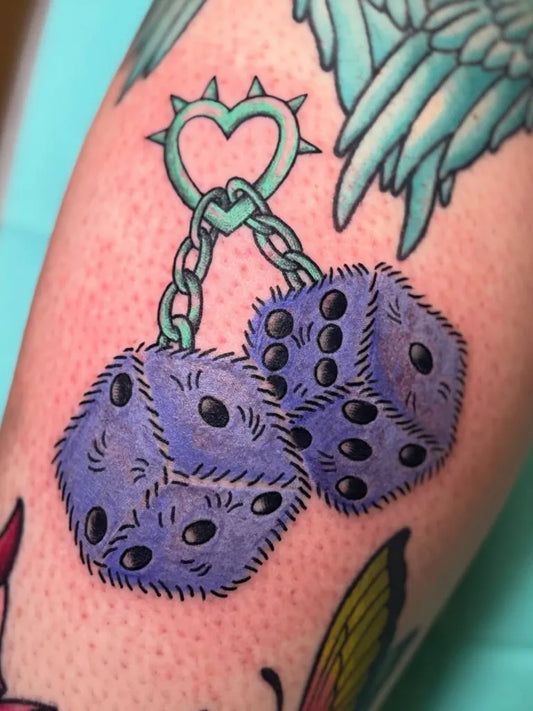 Small Neotraditional Dice and Heart Tattoo on Women Arm by @albertstreettattoo