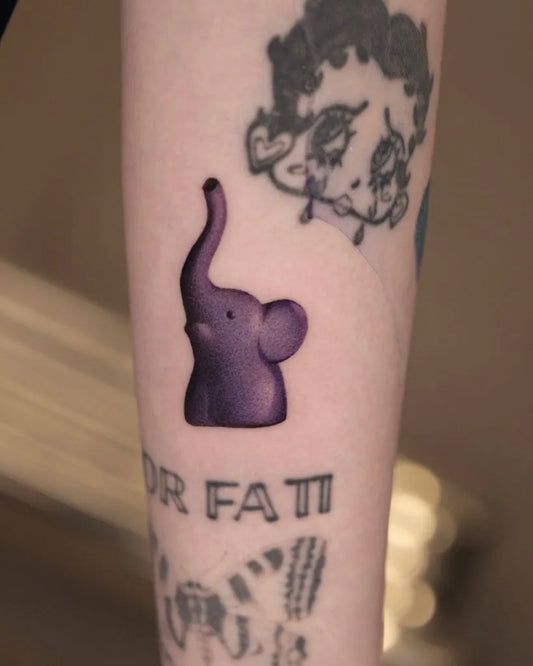 Small Neotraditional Elephant Betty Boop Tattoo on Women Arm by @gall1um_ink