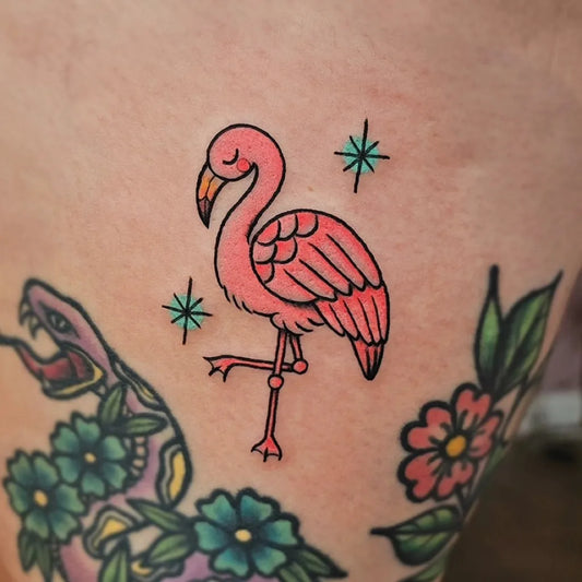 Small Neotraditional Flamingo and Stars Tattoo on Women Thigh by @rachel_marion_