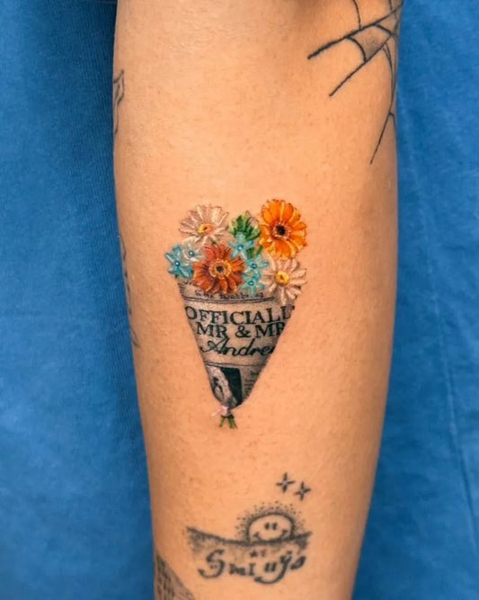Small Neotraditional Flower Bouquet with Daisies on Women Thigh Flower Tattoo by @huxi.tatt