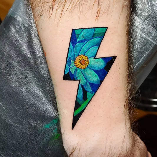 Small Neotraditional Lightning Bolt Flower Tattoo on Men Forearm by @jkhllwy