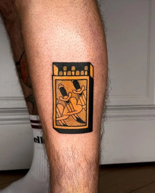Small Neotraditional Matchbox with Knives on Men Calf Tattoo by @friedrich_heyden