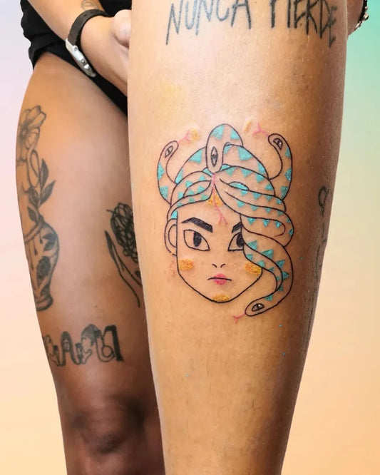 Small Neotraditional Medusa and Snakes on Women Thigh Tattoo by @carmen.ilustra.tattoo
