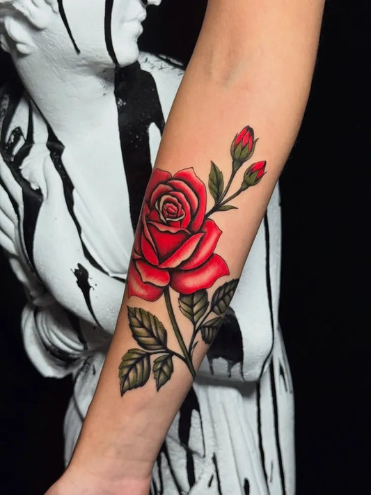 Small Neotraditional Red Rose Stem on Women Arm Tattoo by @kellyred