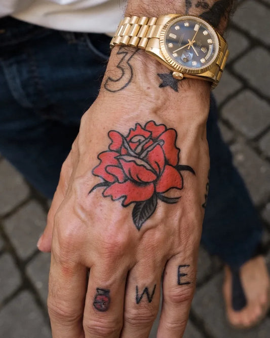Small Neotraditional Rose and Letters on Men Hand Tattoo by @tatobulle
