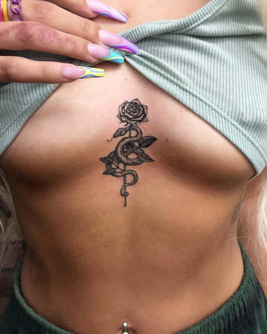 Small Neotraditional Rose and Snake on Women Sternum Tattoo by @steveohtattoo