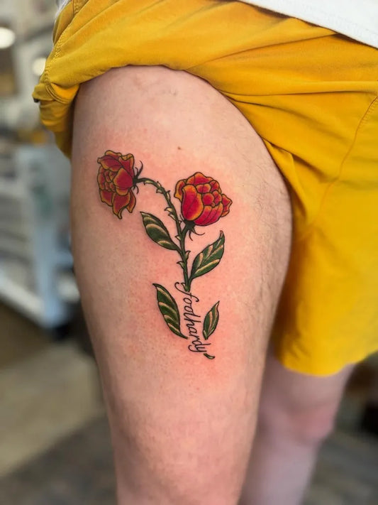 Small Neotraditional Roses with Judith on Women Thigh Tattoo by @catbernardy