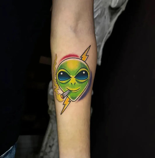 Small Neotraditional Smoking Alien Tattoo on Women Arm by @seifgomez