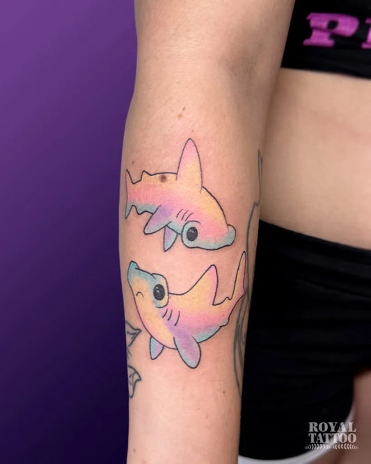 Small Neotraditional Two Hammerhead Sharks on Women Arm Tattoo by @royaltattooyyc