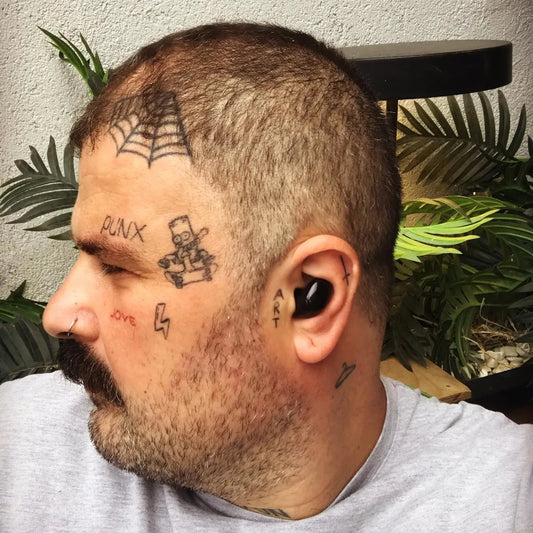 Small Neotraditional Web and Character on Men Face Tattoo by @oktayinkalinyanagi