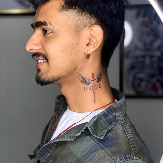 Small Neotraditional Wings Cross Hope on Men Neck Tattoo by @kalakaar22