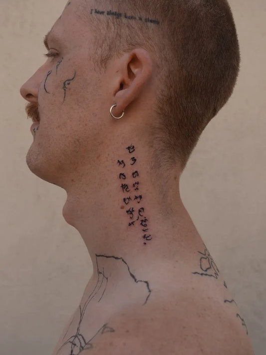 Small Neotribal Korean Script on Men Neck Tattoo by @waomaoa___tattoo