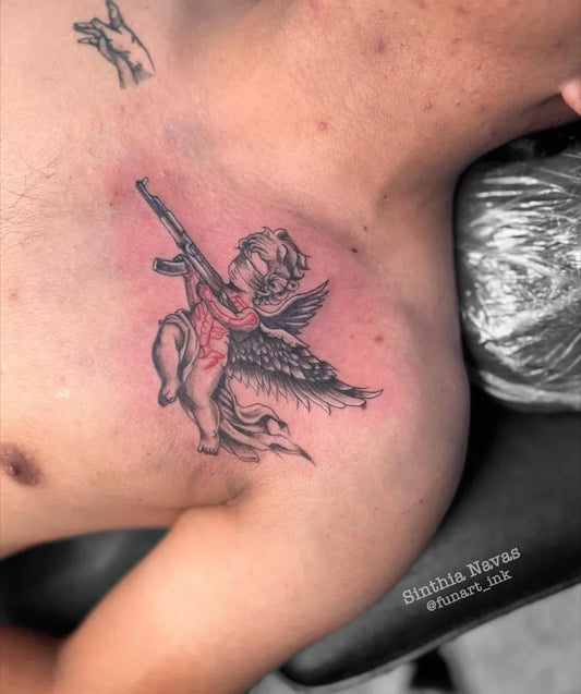 Small New School Armed Angel on Men Chest Tattoo by @funart_ink