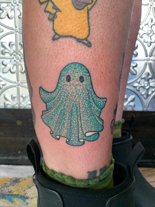 Small New School Ghost Tattoo on Women Leg by @kate_e_green