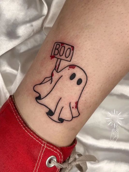 Small New School Ghost with Bloody Sign Tattoo on Women Ankle by @mercadora_oficial