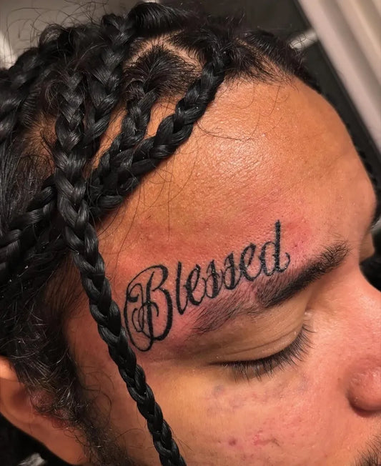 Small Old School Blessed Word on Men Face Tattoo by @tats.by.vaehh