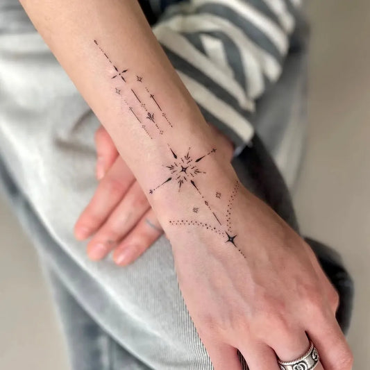 Small Ornamental Compass Star Dots Tattoo on Women Wrist by @hudson.seoul