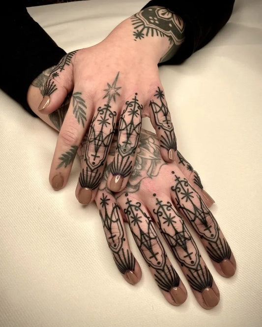 Small Ornamental Finger Ornaments Tattoo on Women Hands by @susannmarleen