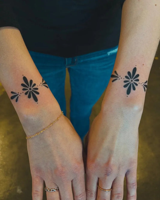 Small Ornamental Floral Bracelet Tattoo on Women Wrists by @noelleseraphine