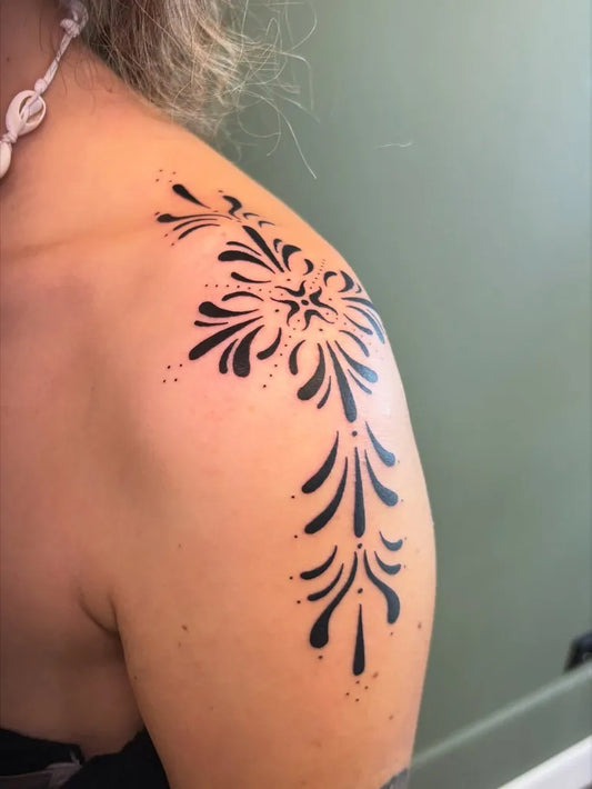Small Ornamental Floral Design Tattoo on Women Shoulder by @adash.the.tattooer