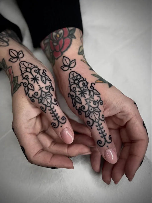 Small Ornamental Lace Hands Tattoo on Women by @susannmarleen