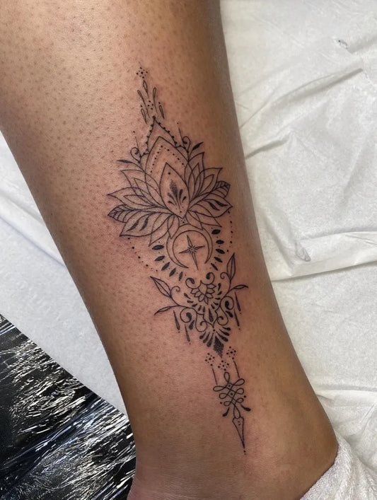 Small Ornamental Mandala and Floral Tattoo on Women Ankle by @inknhems