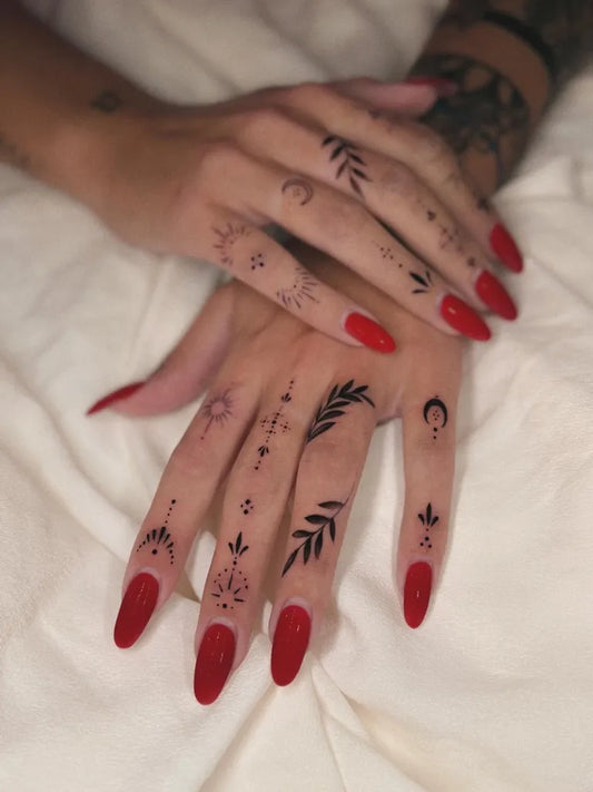 Small Ornamental Sun Moon Leaf Tattoo on Women Hands by @elenayelloww