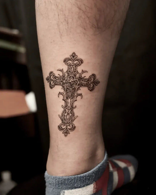 Small Ornate Cross on Men Leg Tattoo by @lusoul_tt