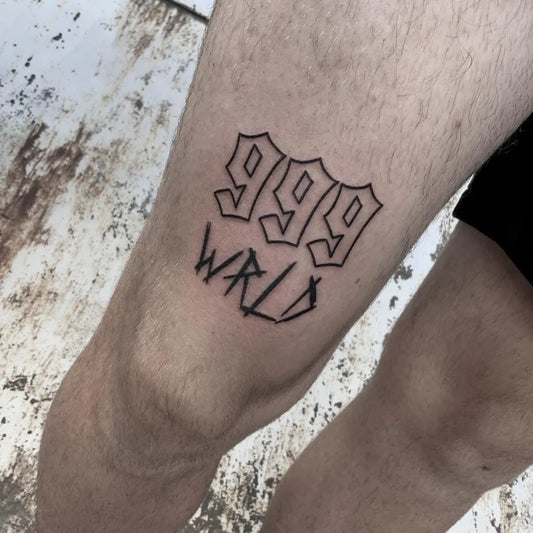 Small Outline 999 Wrld Tattoo on Men Leg by @ratajewsky