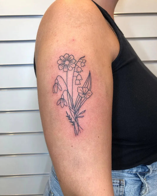 Small Outline Flower Bouquet Tattoo on Women Arm by @ritasimonntattoo
