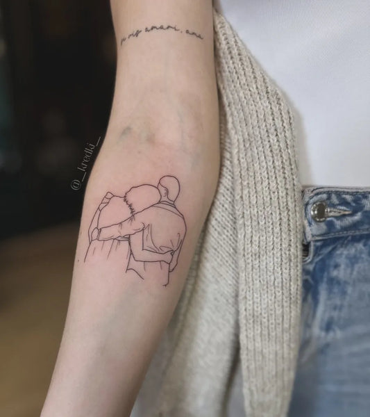 Small Outline HuggingCouple Tattoo on Women Arm by @_kredki_