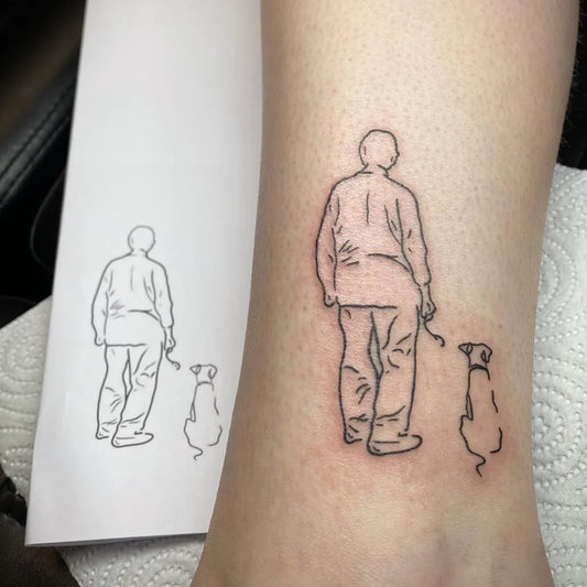 Small Outline Man and Dog Tattoo on Women Leg by @lovaah_tattoos