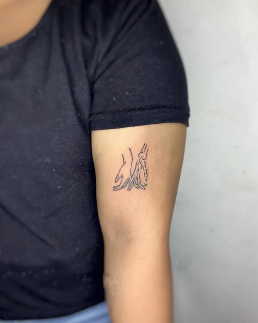 Small Outline Two Fish Women Arm by @joemink_tattoo_jambi