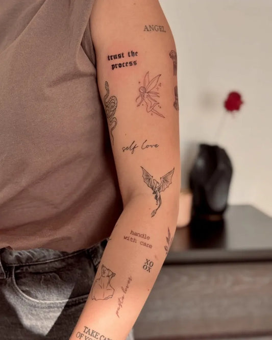 Small Patchwork Angel Wings and Snakes on Women Arm Tattoo by @jasminzsky.tattoo