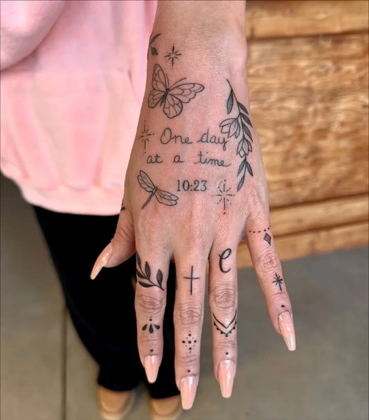 Small Patchwork Butterfly Dragonfly Greenery on Women Hand Tattoo by @hausoflilithtattoo