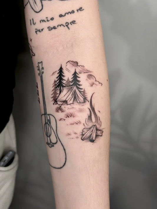 Small Patchwork Camping Guitar Italian Text on Women Arm Tattoo by @alicerosetattoo