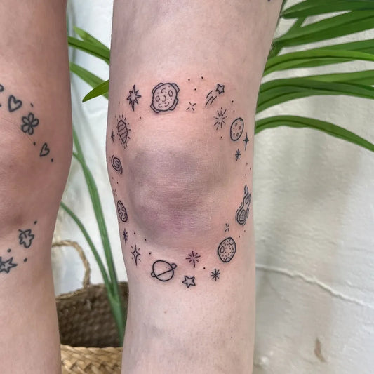 Small Patchwork Cosmic Orbit on Women Knee Tattoo by @jadehazetattoo
