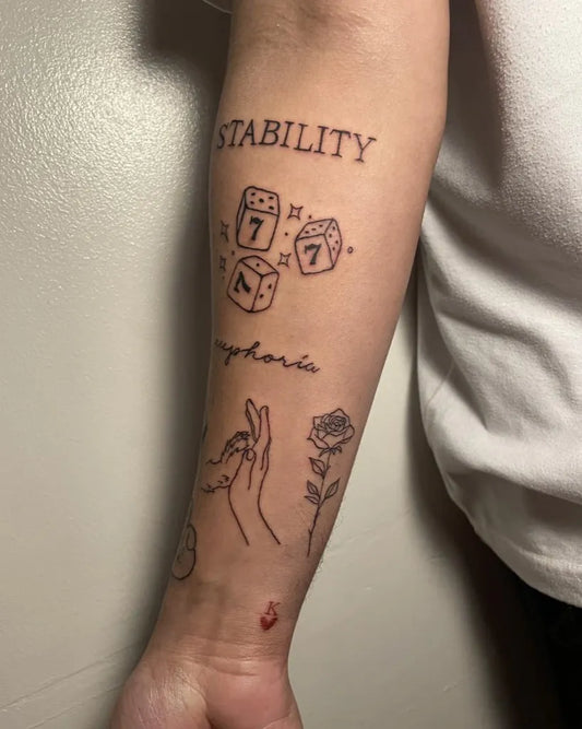 Small Patchwork Dice Rose Hand on Women Arm Tattoo by @maginhawatattoostudio