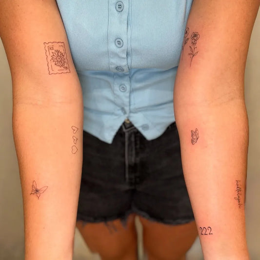 Small Patchwork Floral Designs Hearts Numbers on Women Arms Tattoo by @inkedbyash__