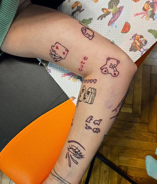 Small Patchwork Playing Cards Eye Cute Figures on Women Arm Tattoo by @grannytattooart