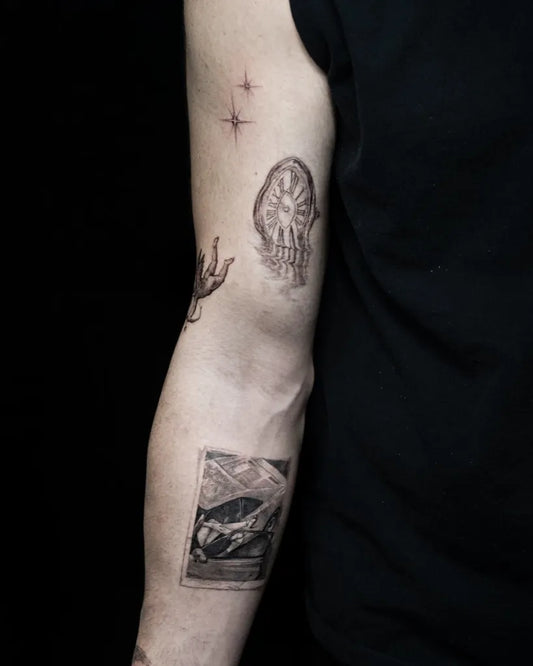 Small Patchwork Stars Jellyfish Hand Mountain on Men Arm Tattoo by @coldgraytattoo