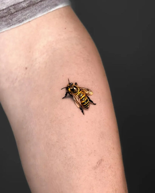 Small Realism Bee on Women Arm Tattoo by @dionne.tattoo